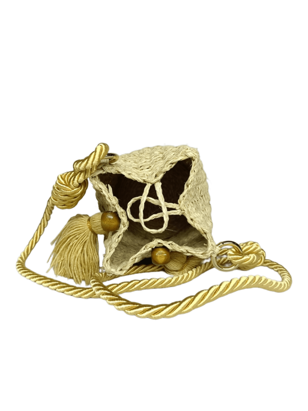 Mochila acostada abierta elaborado en palma de iraca con borlas color beige y lazo beige