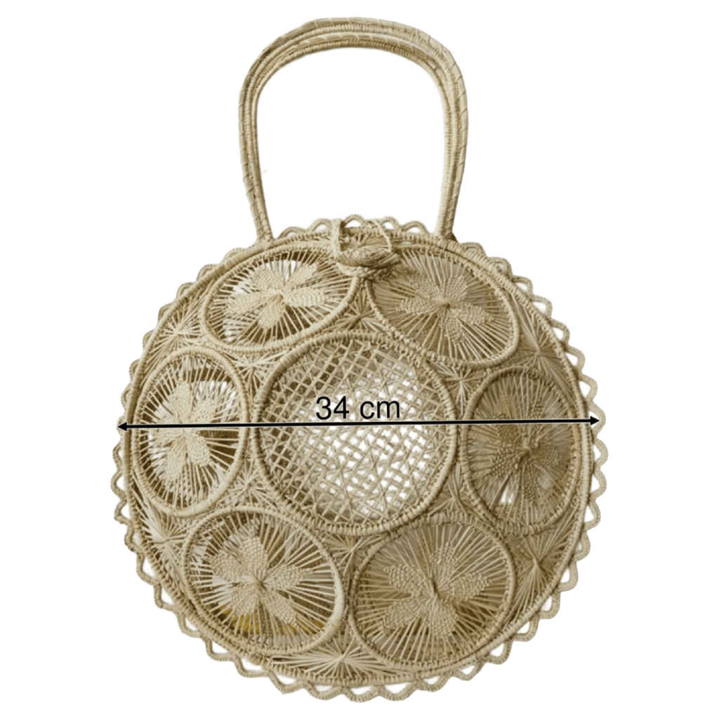 Bolso elaborado en palma de iraca tipo panera color beige