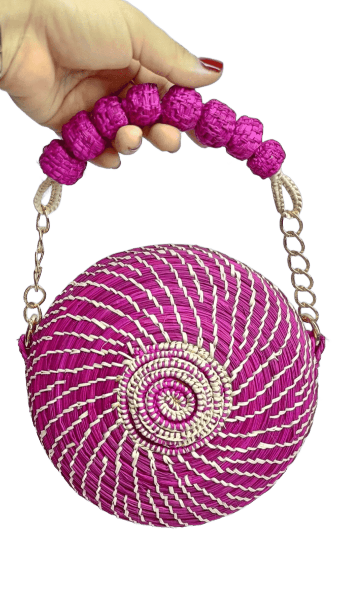 Yoyo lizo con cadeneta de color fucsia elaborada en palma de iraca